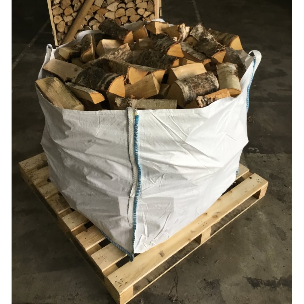 Kiln-dried birch logs packed in a ventilated bulk bag